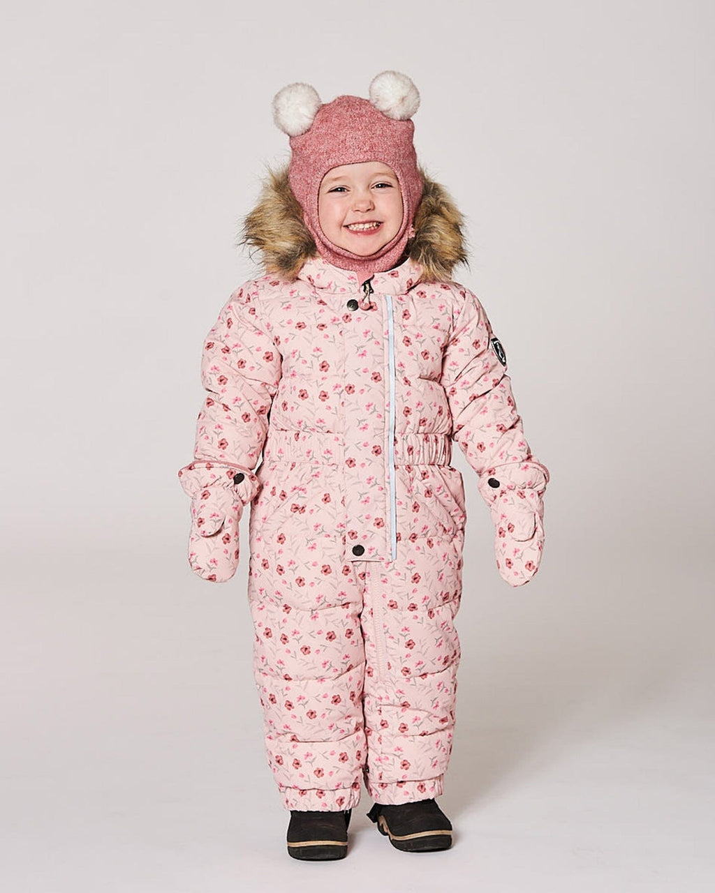 Baby Puffy Snowsuit in soft pink with mini floral prints, perfect for keeping babies warm during winter.