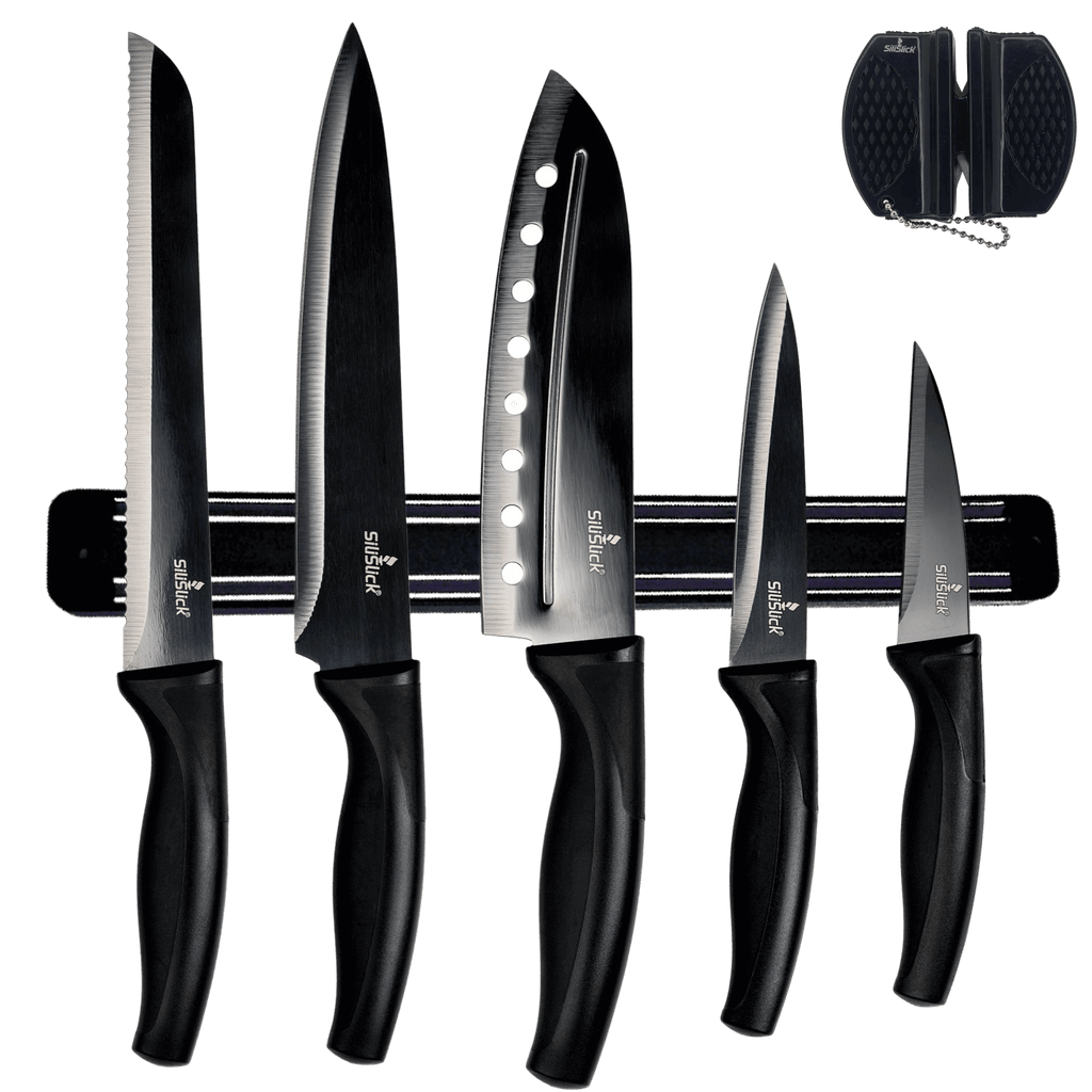 Magnetic Knife Holder Strip with five kitchen knives and a knife sharpener on a wall mount for easy access.